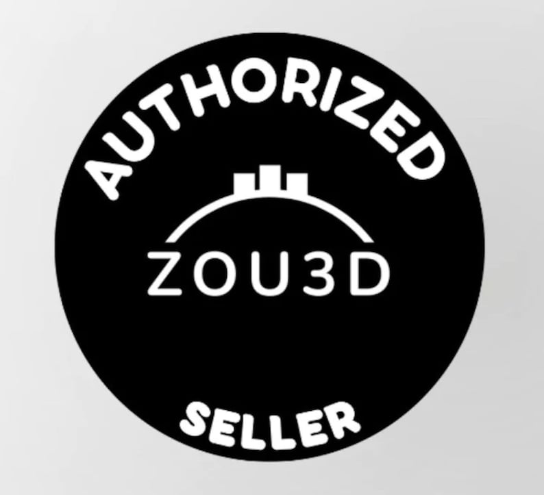 May include: Black and white circular sticker with the text "AUTHORIZED ZOU3D SELLER" in white. The logo features a stylised building with a curved roof.