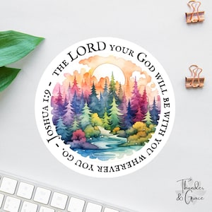 May include: A round sticker featuring a watercolor illustration of a colorful forest scene with a river and a sunset. The text reads "The Lord your God will be with you wherever you go. Joshua 1:9."