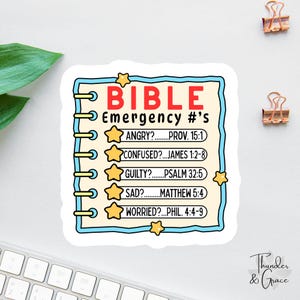 May include: A sticker with the text "BIBLE Emergency #'s" in red and black. The sticker has a blue border and features a list of emotions with corresponding Bible verses, including "Angry?" and "Confused?"