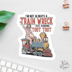 May include: A sticker featuring a vintage illustration of a woman waving from a colorful train. The text reads "I'm not always a train wreck, just kidding, toot toot." The design includes red, blue, and yellow accents.