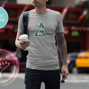 May include: A grey t-shirt with a green triangle logo that says "YOYODYNE" and "DIGITAL SYSTEMS".