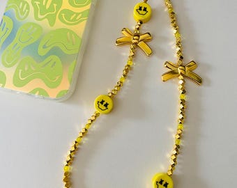 Borsa regalo di compleanno con sorriso dorato Portachiavi mobile