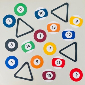 May include: A selection of colourful billiard ball cutouts, each with a different number from 1 to 15, and three black triangle rack shapes. The balls are in various colours, including green, blue, red, orange, and yellow.