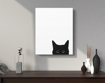 Peut inclure: Une silhouette de chat noir avec des yeux jaunes qui regarde par-dessus une toile blanche.