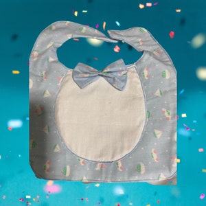 32. Large Lt blue Airplane Pattern Bow-tie Bib