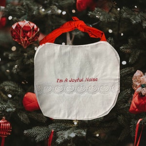 15. I’m A Joyful Noise Bib