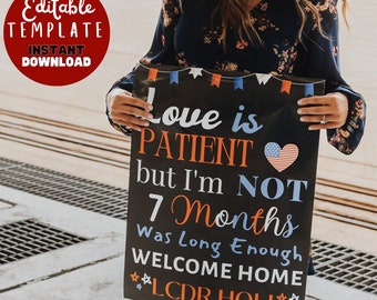 May include: Black and white welcome home sign with red, white, and blue accents. The sign reads "Love is Patient but I'm Not 7 Months Was Long Enough Welcome Home LCDR HOLL".