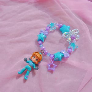 Pulsera/llavero vintage con dije de diablo Kandi de Sakura Cardcaptor
