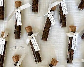 Coffee beans in a test tube as a gift for guests