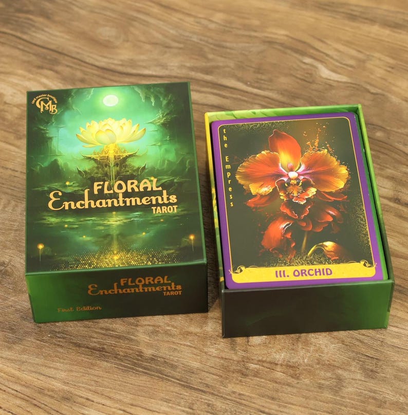 Close up of the Floral Enchantments Tarot gift box with a golden lotus design on a rich green background.