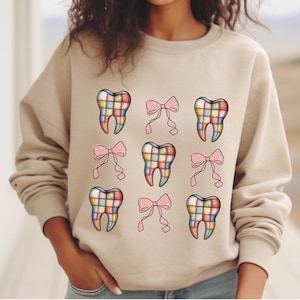 Dental sweatshirt tooth and bow shirt dental assistant gift dentist crewneck gift for dental hygienist dental student gifts cute tooth shirt