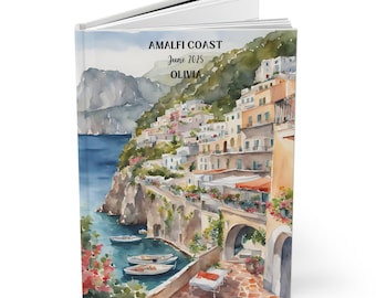 May include: A watercolor painting of a colorful Italian village on a cliff overlooking the sea. The painting is titled "Amalfi Coast June 2025 Olivia".
