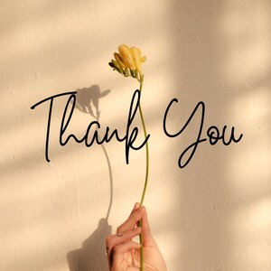 May include: A simple thank you message written in black script on a beige background with a single yellow flower in the centre.