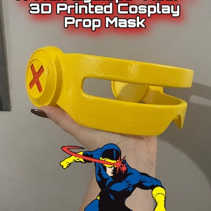 May include: A bright yellow 3D printed Cyclops visor mask featuring a circular side emblem with a red X. The text X-Men Cyclops Visor - 3D Printed Cosplay Prop Mask is visible above the object, which is shown with a graphic of the character.