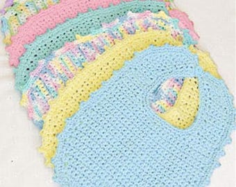 May include: A stack of five crocheted bibs in pastel colors including light blue, yellow, mint green, pink, and lavender. Each bib features a textured, open-weave pattern with a scalloped edge and a central opening for the neck area.