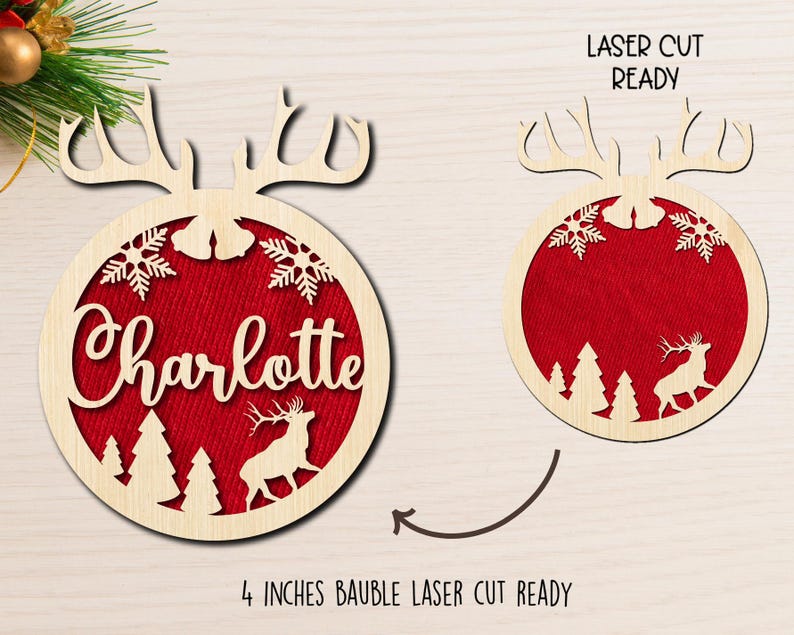 May include: A 4 inch wooden Christmas ornament with a reindeer and snowflakes design. The ornament is laser cut and ready to be personalized with the name "Charlotte".