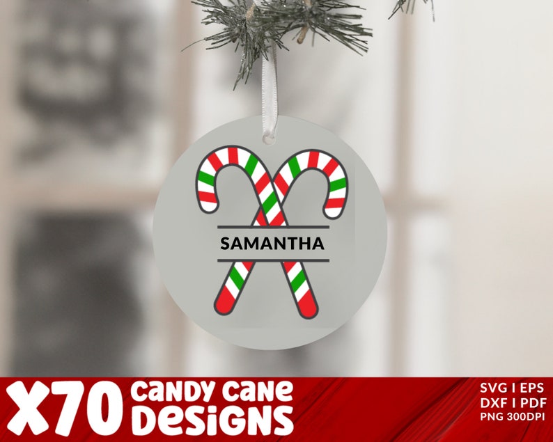 May include: A white round Christmas ornament with two red and white candy canes crossed over each other. The candy canes have green stripes. The ornament has the name "SAMANTHA" written in black letters on a white banner.
