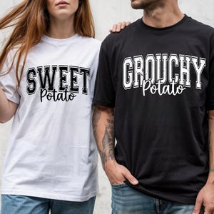 May include: A white t-shirt with the text SWEET Potato in black and a black t-shirt with the text GROUCHY Potato in white. Both shirts feature a distressed collegiate font for the first word and a cursive script font for the second word.