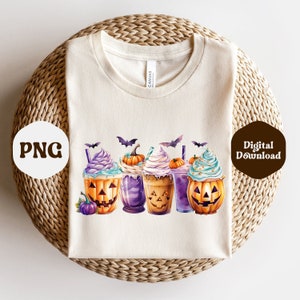 May include: A white t-shirt with a design of four pumpkin spice lattes with bats and a small pumpkin. The lattes are topped with whipped cream and sprinkles. The text "Digital Download" is in the upper right corner of the image.
