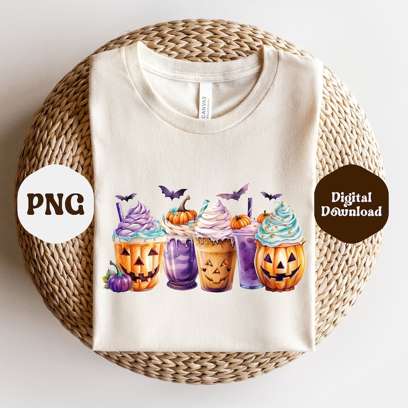 May include: A white t-shirt with a design of four pumpkin spice lattes with bats and a small pumpkin. The lattes are topped with whipped cream and sprinkles. The text "Digital Download" is in the upper right corner of the image.