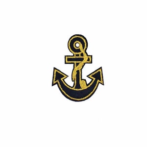 May include: Black anchor with a gold outline. The anchor is a nautical symbol and is often used as a decorative element.