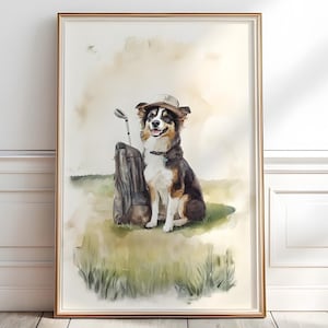 May include: Watercolor painting of a dog wearing a hat, sitting on a green lawn next to a golf bag and club. The dog has brown, black, and white fur. The artwork is framed in a gold-colored frame.