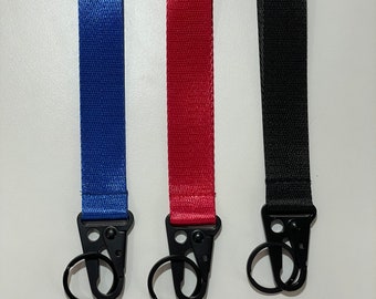 トレンディなスポーツショートストラップリストレットメタルクリップカーバッグチャームキーチェーン