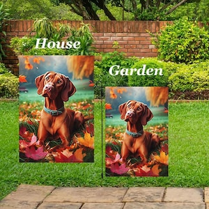 May include: Two garden flags featuring a brown dog illustration with a blue collar, set amongst autumn leaves. The word "House" is above the larger flag, and "Garden" is above the smaller one, perfect for outdoor decor.