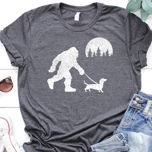 Bigfoot Walking Wiener Dog Funny Sasquatch Dachshund T-Shirt, Wiener Dog Gifts, Dog Lover Shirt,Funny Bigfoot Shirt, Dog Owner Gifts
