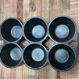 Pulled a 130 year old griswold cast iron muffin pan at the bins