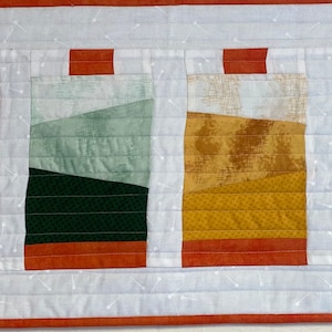 Sewing spools wall hanging kit.