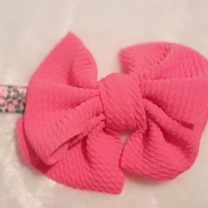 Diadema de implante coclear con estampado floral y de guepardo con lazo