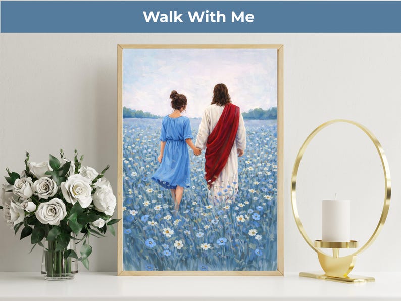 May include: Framed art print depicting two figures walking through a field of blue flowers. The figures are holding hands, with one wearing a blue dress and the other a white robe with a red sash. The text "Walk With Me" is at the top.
