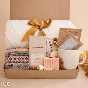 Relaxation birthday gift box with nordic socks, throw blanket and handmade soap.