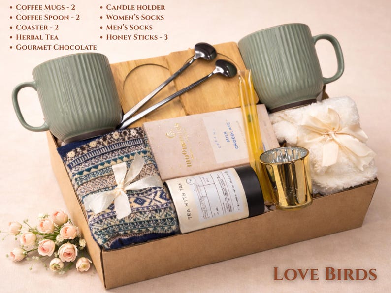 Love Birds gift box with romantic tones, matching items for couples, cozy blanket and treats arranged in a kraft box