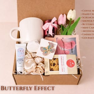 Whimsical "The Butterfly Effect" Gift Box with butterfly-themed accessories, soft textiles, and pampering spa treats.
