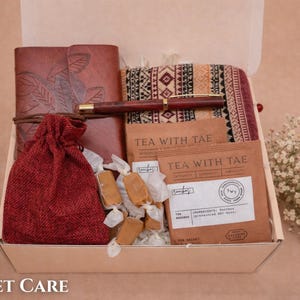 Simple get well gift basket featuring high-quality everyday comfort items for her.