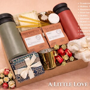 A Little Love Box gift box with soft pink tones, self care items, candle and sweet touches in a kraft box for a thoughtful gift