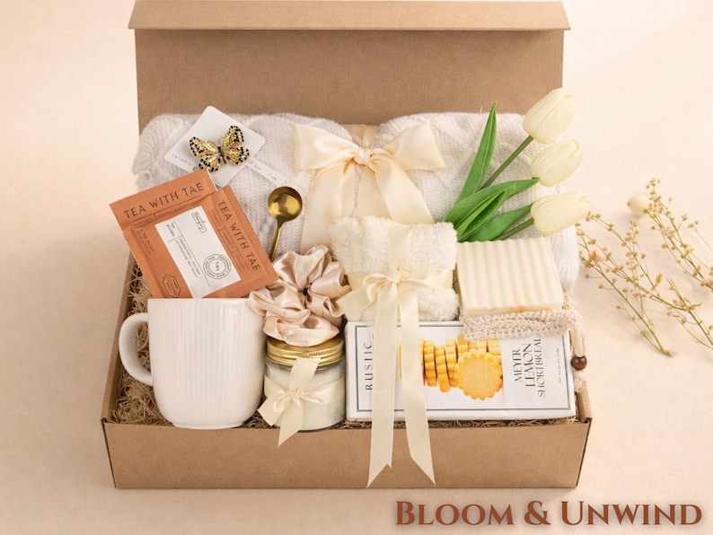 Bloom and Unwind after surgery gift box for her with cozy throw blanket, tea mug, candle, fluffy socks, handmade soap, lemon shortbread cookies and tulips in kraft box perfect self care get well soon gift for women