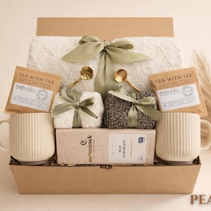 Peace gift box with pastel tones, blanket and candle in a kraft box, a thoughtful realtor closing gift for homeowners