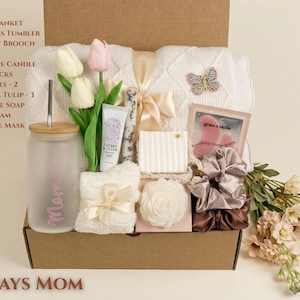 New Mom Gift Basket with "Always Mom" theme, featuring a soft blanket, scented candle, and spa essentials for post-partum care.