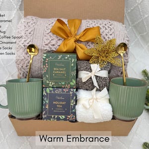 Elegant red ribbon Christmas packaging with greeting card and festive wrapping