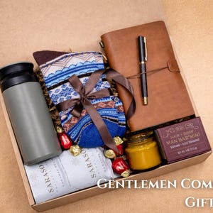 Get well soon gift box for men with a cozy tumbler and a leather journal.