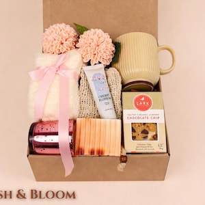 Blush and Bloom birthday gift box for her with fluffy socks, handmade soap, candle, tea mug, cookies, hand cream and pink floral spa gifts in kraft box perfect birthday care package for women