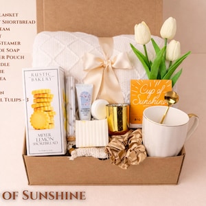 Bright and Cheerful "Cup of Sunshine" Gift Box with yellow-themed spa items, a stylish mug, and artisan snacks for her birthday.