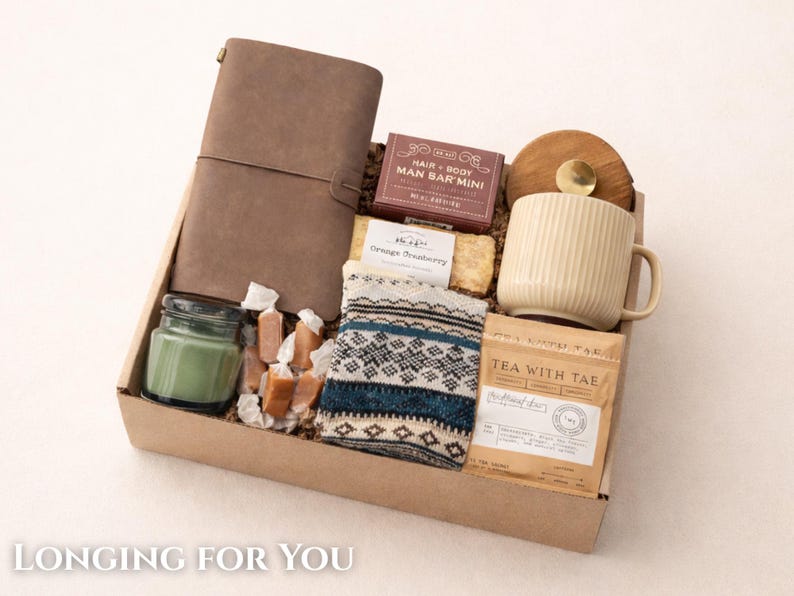 Employee appreciation gift basket with a premium leather journal and pen.
