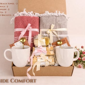 Seaside Comfort gift box with calming neutral and coastal tones, blanket, candle and spa items in a kraft box for relaxation