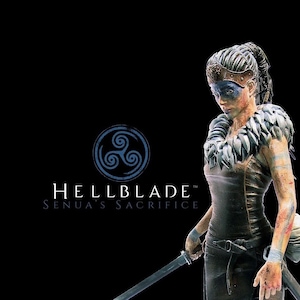 May include: A woman warrior with blue face paint and a feathered shoulder piece holds a sword in a dark background. The text "Hellblade: Senua's Sacrifice" is displayed below a Celtic knot symbol.