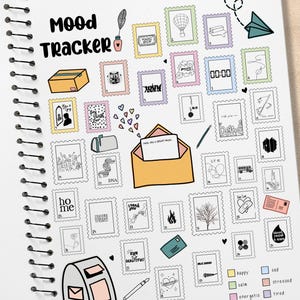 May include: A spiral-bound notebook with a "Mood Tracker" design. The page features postage stamp-style illustrations with various icons and text, including "home," "DNA," and "Run Beautiful!" A color key at the bottom indicates moods like "happy" and "sad."