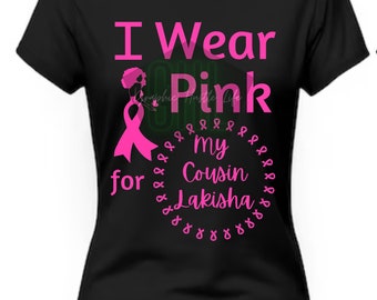 May include: Black t-shirt with the text "I Wear Pink for my Cousin Lakisha" in pink lettering. The text is surrounded by a circle of pink ribbon symbols.